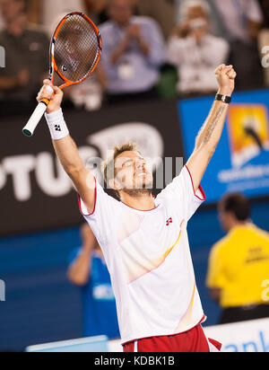 Stanislas Wawrinka di Svizzera festeggia dopo aver vinto la sua prima finale del Grande Slam, l'ottavo seme che durò T. Berdich di Foto Stock