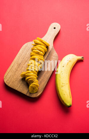 Foto di stock di sano kela ha fatti in casa o di banane chip o wafer o chip di piantaggine, il fuoco selettivo Foto Stock