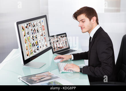 Ritratto di un imprenditore professionale di editing delle immagini in office Foto Stock