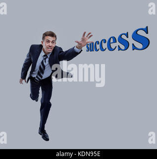 Happy businessman in esecuzione. isolato su sfondo bianco. Foto Stock