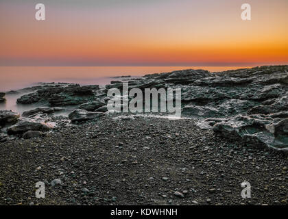 Tramonto a ogmore, South wales, Regno Unito Foto Stock