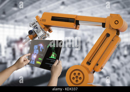 Controllo umano il rendering 3D Warehouse di lavoro di robot in fabbrica Foto Stock
