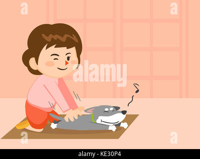 Donna sorridente dando un massaggio al suo cane Foto Stock