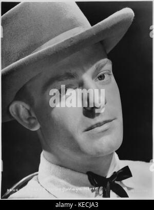 Dennis o'Keefe, Ritratto pubblicitario per il film, 'il cattivo uomo di Brimstone', MGM, 1937 Foto Stock