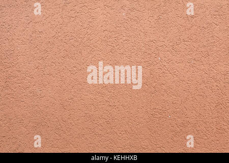 Dipinto di rosa parete in stucco. Texture di sfondo. Foto Stock