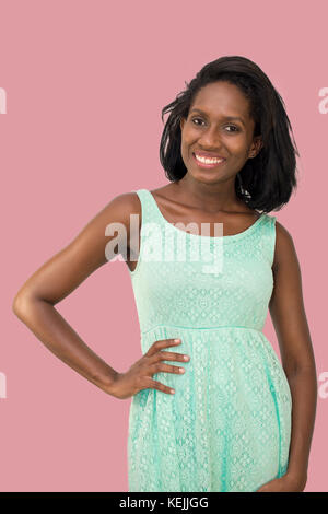 Bella donna con mano sul hip Foto Stock