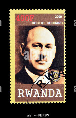 Francobollo cancellato stampato dal Ruanda, che mostra Robert Goddard. Foto Stock