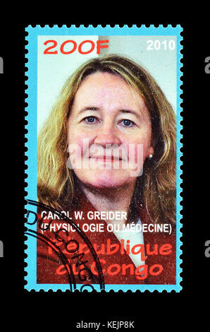 Francobollo cancellato stampato da Congo, che mostra Carol Greider, circa 2010. Foto Stock