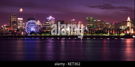 Lo skyline di Montreal e st Lawrence river illuminata di notte, quebec, Canada Foto Stock