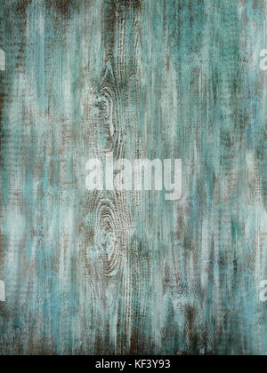 Superficie in legno turchese verniciato in angoscia e con agenti atmosferici che mostra segni di usura e rigature Foto Stock