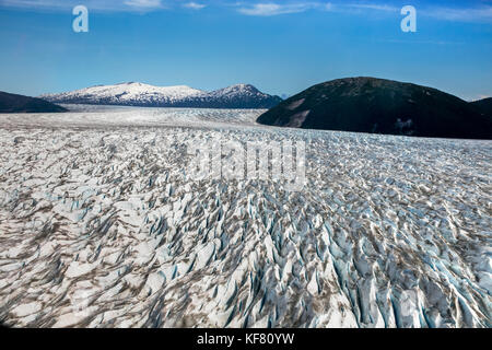 Stati Uniti d'America, Alaska juneau, ariel viste sul ghiacciaio taku visto da elicottero, elicottero dogsled tour vola sopra il ghiacciaio taku al helimush Foto Stock