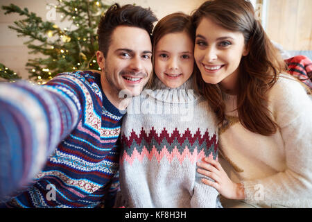 Selfie della famiglia festeggiano il Natale Foto Stock