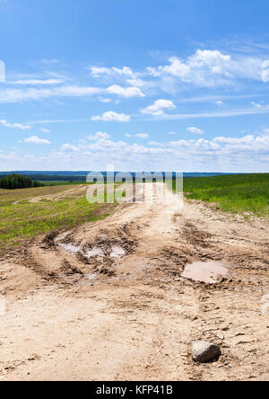 Strada di sabbia pozza Foto Stock