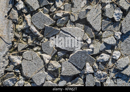 Distrutto pavimento in calcestruzzo texture. grandi pezzi rotti di sfondo in calcestruzzo Foto Stock