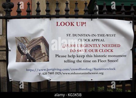 Banner al di fuori della chiesa di st dunstan-in-the-west, Fleet Street, Londra, Inghilterra, chiedendo donazioni per salvare la chiesa orologio Foto Stock