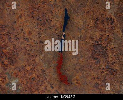 Mappa e Bandiera del Cile sul metallo arrugginito Foto Stock