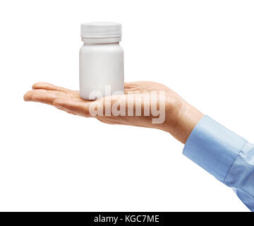 Mano d'Uomo in camicia di contenimento bottiglia medica con le pillole isolati su sfondo bianco. palm, vicino fino ad alta risoluzione prodotto Foto Stock