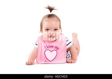 Carino allegro bambina Bavaglino rosa Foto Stock