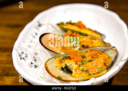 Antipasto di cozze presso un ristorante giapponese Foto Stock