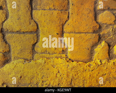 Giallo pavimentazione di pietra lastre, arredamento moderno di design di texture. Foto Stock