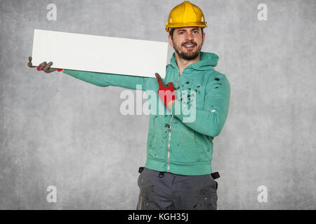 Il lavoratore può contenere una scheda vuota, punti in uno spazio vuoto Foto Stock