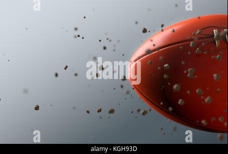 Una sporca orange Aussie Rules sfera catturati in slow motion che vola attraverso la dispersione di aria da particelle di sporco nella sua scia - 3D render Foto Stock