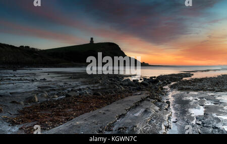 Tramonto in inverno a Kimmeridge Bay, su Jurassic Coast, Dorset Foto Stock