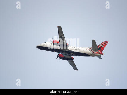 Loganair G-LGNN taxining prima di decollare da Inverness Dalcross Aeroporto. nelle Highlands Scozzesi. Foto Stock