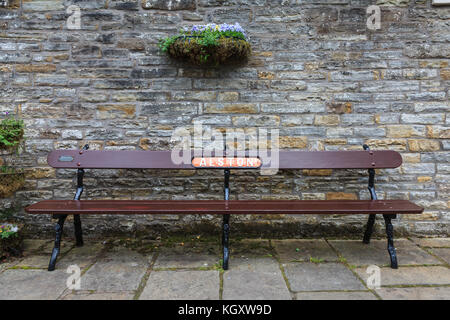 Banco di ferroviaria. Un banco di ferroviaria sulla stazione di Alston sul South Tynedale Railway in Inghilterra settentrionale. Foto Stock