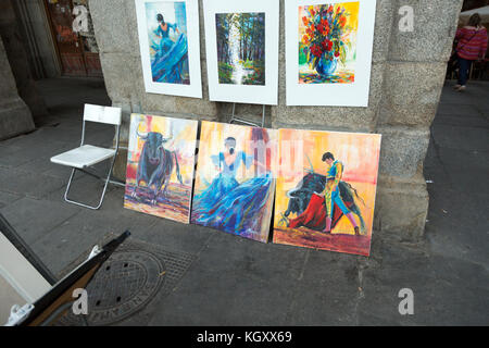 Lo stile tradizionale della pittura di illustrazioni sulla vendita in street, il centro cittadino di Madrid, Spagna Foto Stock