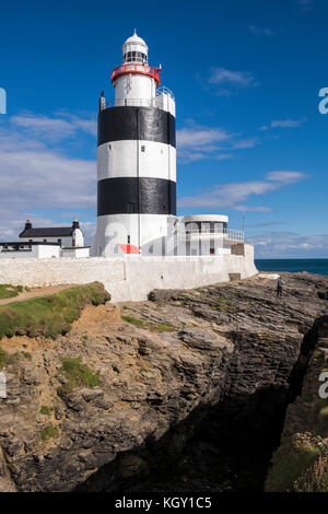 Faro di Hook gancio a testa, County Wexford, Irlanda, più antico faro operative nel mondo Foto Stock