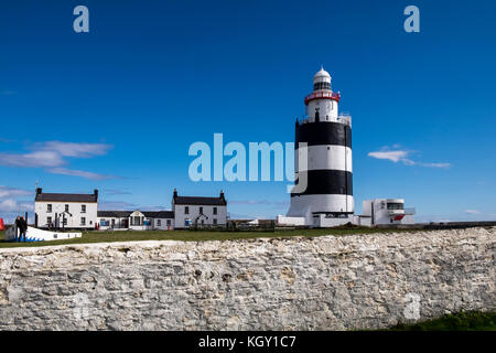 Faro di Hook gancio a testa, County Wexford, Irlanda, più antico faro operative nel mondo Foto Stock