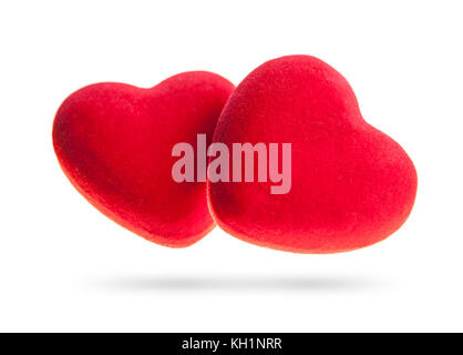 Due cuori in velluto isolato su uno sfondo bianco. concetto per il giorno di san valentino Foto Stock