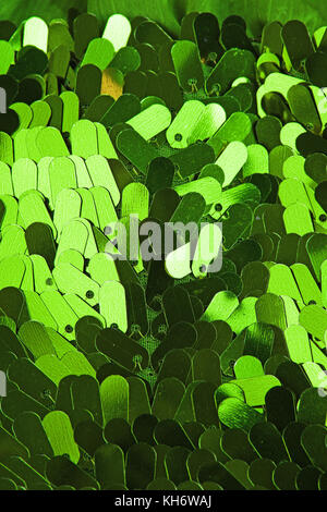 Spangle, sequin pailette sfondo. Abito a specchio panno di materiale modello di texture. Sartoria concetto di cucitura. Shiny specchiata tessuto di moda. Shiny cl Foto Stock