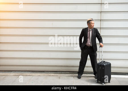 Asian senior business man outdoor Foto Stock