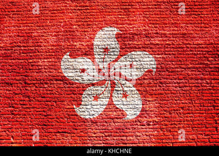 Bandiera nazionale di Hong Kong dipinta su un muro di mattoni. illustrazione 3d. Foto Stock