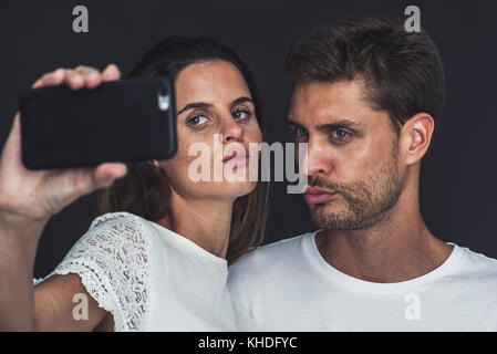 Matura in posa per una selfie insieme Foto Stock
