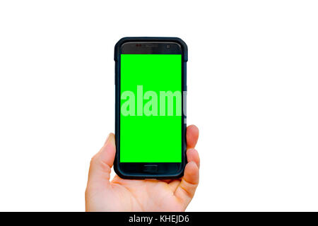 Maschio lato tenendo lo smartphone isolato Foto Stock