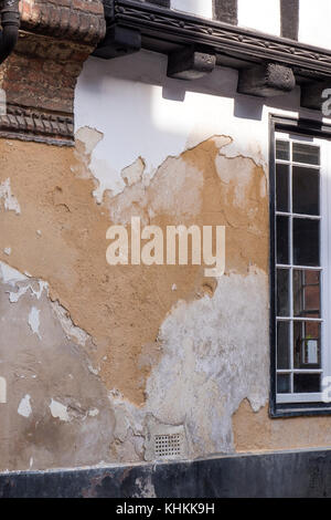 Parete esterna con danni rendono poco Walsingham Norfolk Inghilterra Foto Stock