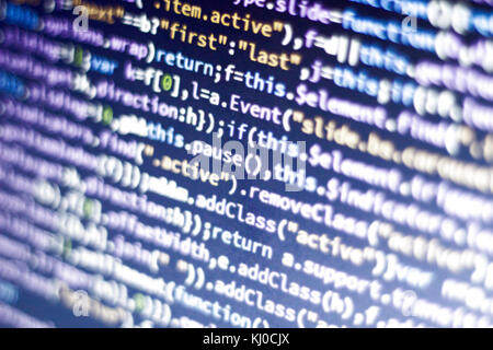 Incandescente minificated codice javascript. schermo astratto del moderno web developer. hacking informatico della rete. Foto Stock