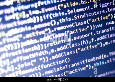 Incandescente minificated codice javascript. schermo astratto del moderno web developer. hacking informatico della rete. Foto Stock