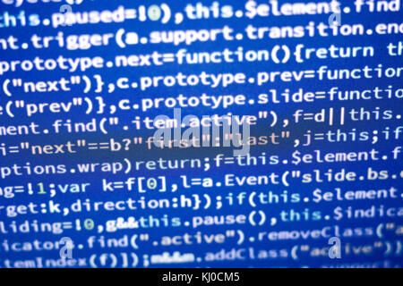 Incandescente minificated codice javascript. schermo astratto del moderno web developer. hacking informatico della rete. Foto Stock
