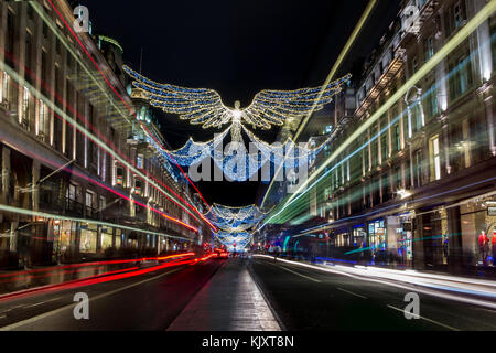 Luci e decorazioni natalizie in Regent Street Foto Stock