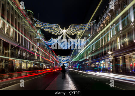 Luci e decorazioni natalizie in Regent Street Foto Stock