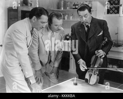 Una pubblicità ancora dal film del 1935 *Charlie Chan in Egypt*, con il famoso detective immaginario Charlie Chan in una scena iconica del film. Foto Stock