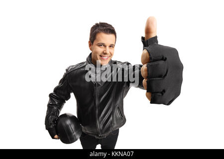 Biker con un casco rendendo un pollice in alto segno isolato su sfondo bianco Foto Stock