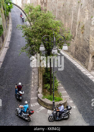 Tre scooters nel tornante Foto Stock