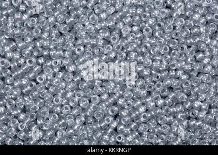 Closeup fotografia di vetro multicolore perle di semi di sfondo. Foto Stock
