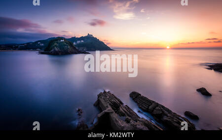 Tramonto a Donostia San Sebastian shot dal Paseo nuevo. Foto Stock