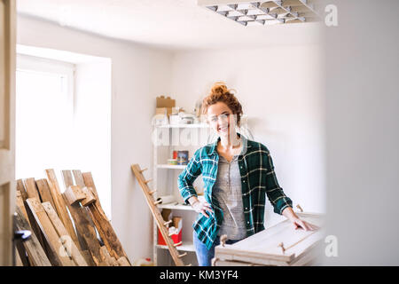 Small business di una giovane donna. Foto Stock